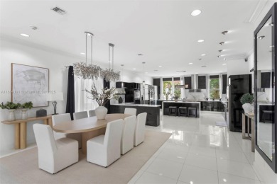 Live the waterfront lifestyle in this elegant townhouse