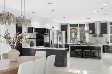 Live the waterfront lifestyle in this elegant townhouse