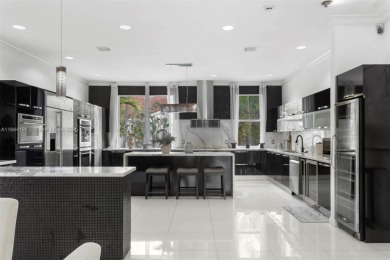 Live the waterfront lifestyle in this elegant townhouse