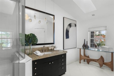 Live the waterfront lifestyle in this elegant townhouse