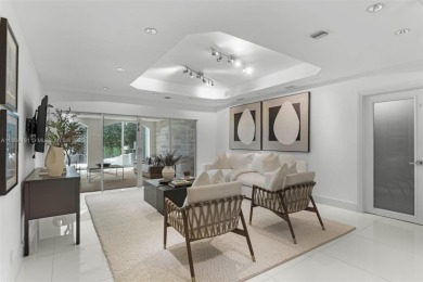 Live the waterfront lifestyle in this elegant townhouse