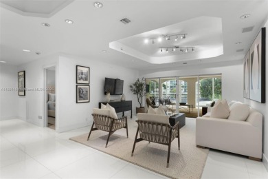 Live the waterfront lifestyle in this elegant townhouse