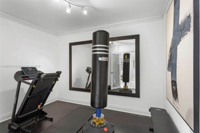 Live the waterfront lifestyle in this elegant townhouse