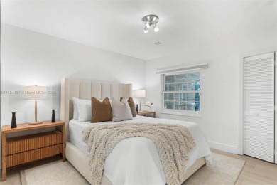 Live the waterfront lifestyle in this elegant townhouse