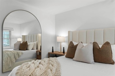 Live the waterfront lifestyle in this elegant townhouse