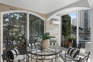 Live the waterfront lifestyle in this elegant townhouse