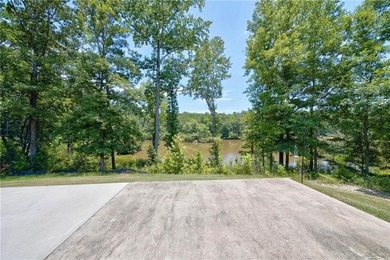 Savor the serenity of nature in your lakefront property in your - photo 11