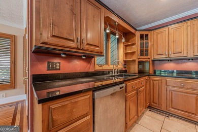 Welcome to 137 Broadwater Court in the highly sought-after gated - photo 12