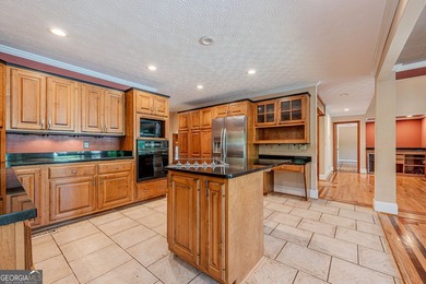 Welcome to 137 Broadwater Court in the highly sought-after gated - photo 17