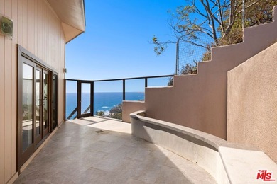 Perched above one of Orange County's most coveted stretches of - photo 22