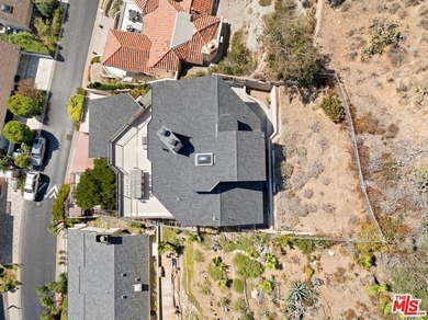 Perched above one of Orange County's most coveted stretches of - photo 40
