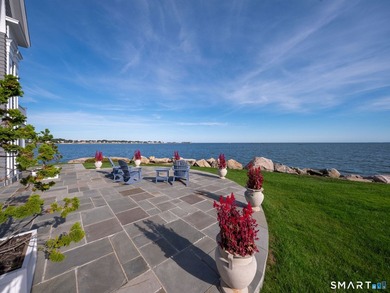 This magical light-filled New England 7,945 s.f. *cottage* takes - photo 8