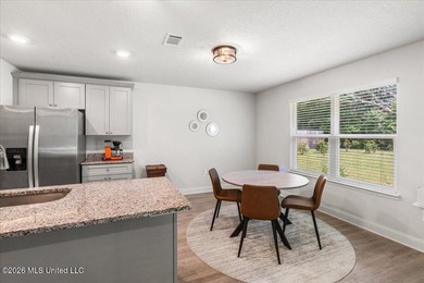 Beautifully maintained 4-bedroom, 2-bath home conveniently - photo 11