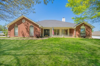 Beautiful traditional home located in Honeysuckle Farms located - Lake Home For Sale in Longview, Texas