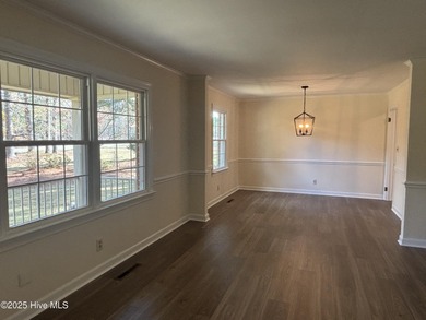 Wow! This traditional brick ranch has undergone a redo and is