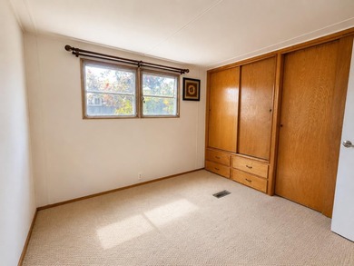 A spacious 2-bedroom, 2-bath mobile home located in the - photo 11
