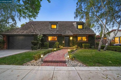Behind the ivy-covered brick and shingled rooflines of this 1936 - photo 2