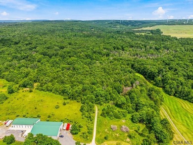 Wooded lot on .74 acres Property markers are visible. Provides - photo 6