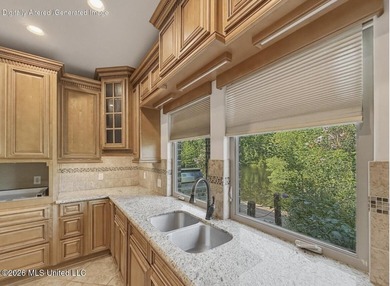 LAKE PROPERTY! Experience peaceful lakefront living in this - photo 12