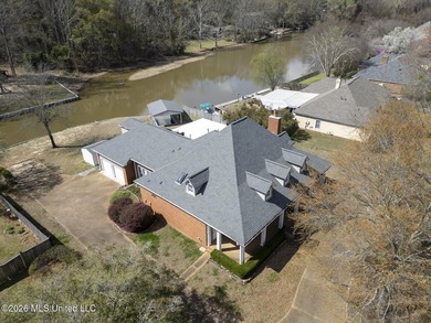 REDUCED AND BELOW APPRAISAL BY $15,000! WATERFRONT with covered - photo 2