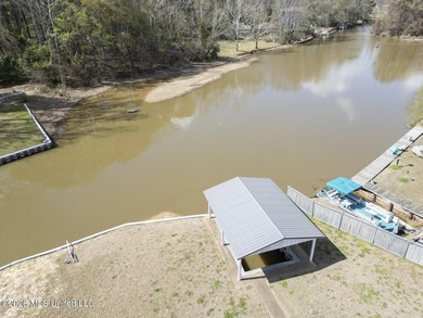 REDUCED AND BELOW APPRAISAL BY $15,000! WATERFRONT with covered - photo 3