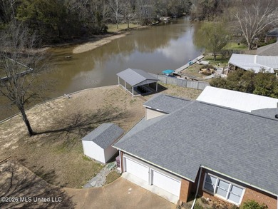 REDUCED AND BELOW APPRAISAL BY $15,000! WATERFRONT with covered - photo 4