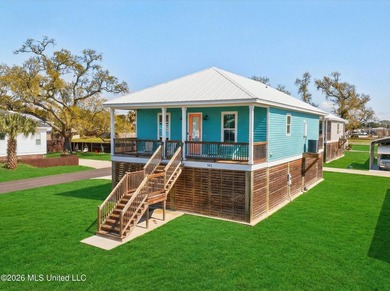 Beach views, double corner lot, and coastal charm without the - photo 2
