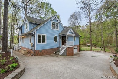 Welcome to this charming waterfront retreat offering the perfect - photo 1