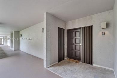 Discover one of Key Colony's most coveted floor plans in the - photo 3