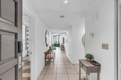 Discover one of Key Colony's most coveted floor plans in the - photo 4