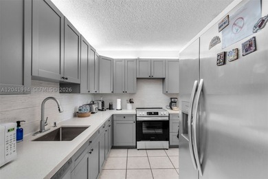 Discover one of Key Colony's most coveted floor plans in the - photo 9