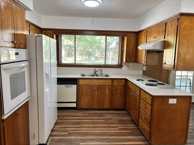 GREAT HOME WITH LOT OF UPDATES. NICE SHADED LOT, COVERED BACK