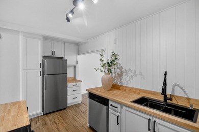 NEWLY REMODELED HOME WITH TWO GARAGES!Welcome to this charming - photo 11