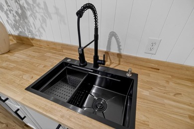 NEWLY REMODELED HOME WITH TWO GARAGES!Welcome to this charming - photo 12