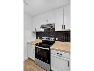 NEWLY REMODELED HOME WITH TWO GARAGES!Welcome to this charming - photo 13