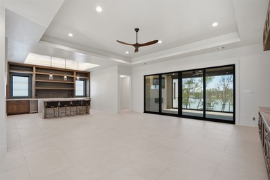 Embrace the tranquility of lakeside living with this brand-new - photo 22