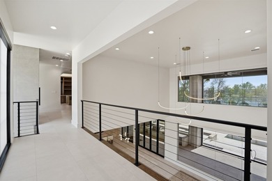 Embrace the tranquility of lakeside living with this brand-new - photo 23