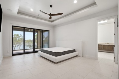 Embrace the tranquility of lakeside living with this brand-new - photo 24