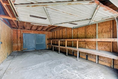 NEWLY REMODELED HOME WITH TWO GARAGES!Welcome to this charming - photo 28