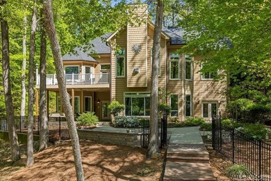 Positioned in a prestigious waterfront neighborhood, this - photo 2