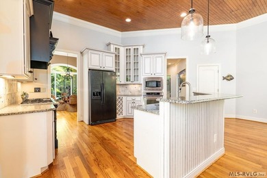 Positioned in a prestigious waterfront neighborhood, this - photo 9