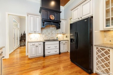Positioned in a prestigious waterfront neighborhood, this - photo 10