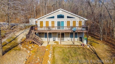 This is the home for you if you are looking for peace, calm and - Lake Home For Sale in Rocky Mount, Missouri