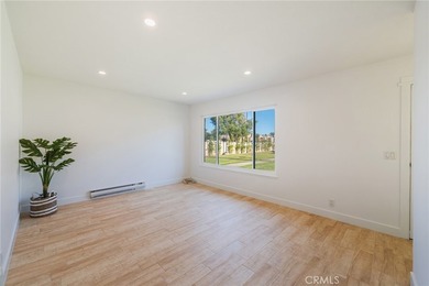 Welcome Home to this Beautifully Maintained Updated End-Unit - photo 5