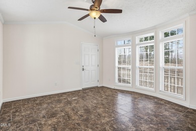 This beautiful home is set on nearly one acre of fully fenced