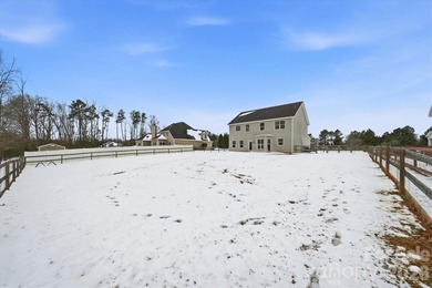 MOTIVATED SELLER! This wonderful home is located inside a gated - photo 3