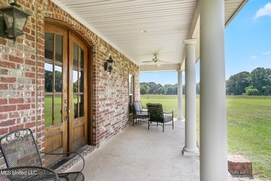 This custom-built equestrian property in Terry offers a - photo 14