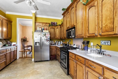 This custom-built equestrian property in Terry offers a - photo 23
