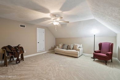 This custom-built equestrian property in Terry offers a - photo 33
