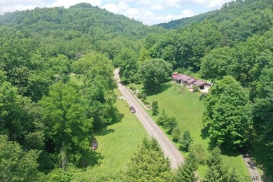 Nestled on 5.6 beautiful wooded acres in scenic Lower Turkeyfoot - photo 9